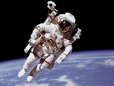 Astronauts repeat spacewalk to complete camera job
