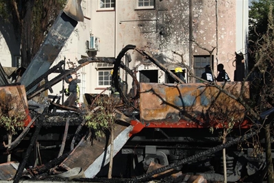 Emotions run high over burnt train