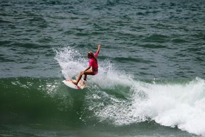 Junior surfers in action