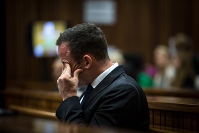 Nel picks through crime scene photos