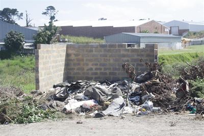 Refuse dump on doorstep stinks