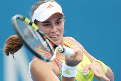 Puig beats former champion Petkovic to reach semis