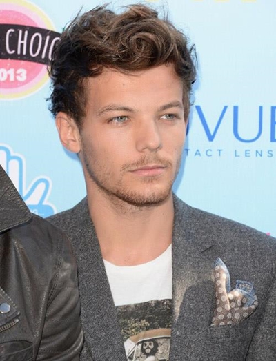 One Direction star buys hometown football club
