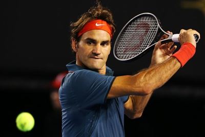 Federer into Wimbledon 2nd round