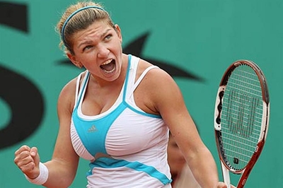 Halep reaches first Wimbledon quarter-final