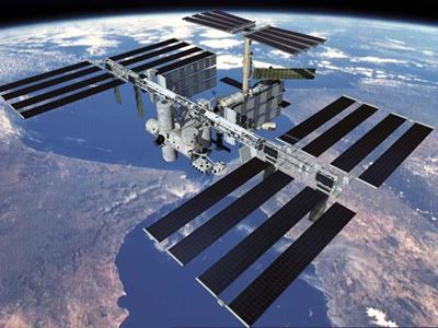 Russian cargo craft docks with ISS, science satellite falls