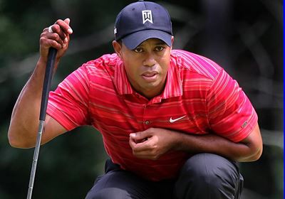 Woods' future uncertain with more back pain