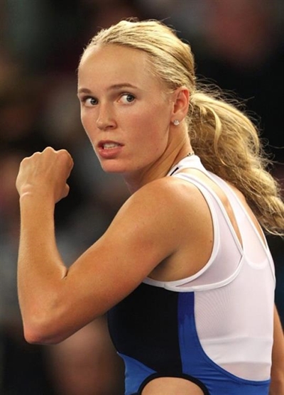 Four-time winner Wozniacki ousted at New Haven