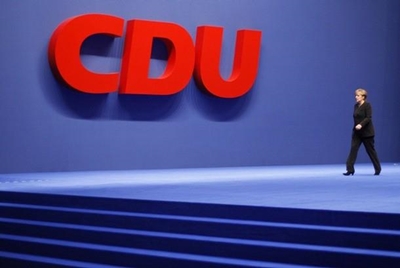 Merkel calls anti-euro party success a 'protest vote'