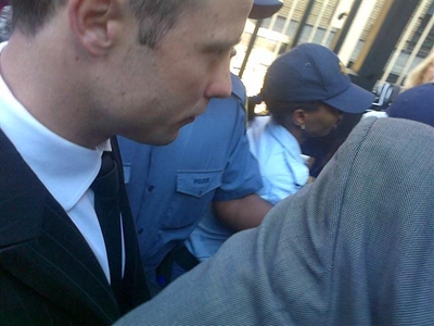 Pistorius escorted to dock