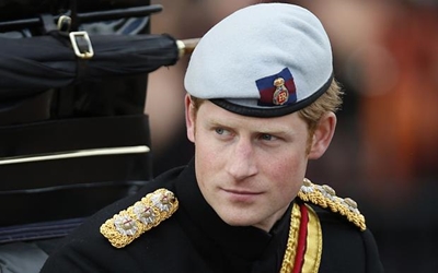 Britain's Prince Harry turns 30 with a beer - and millions