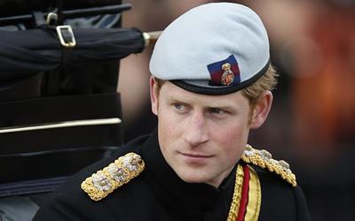 Britain's Prince Harry turns 30 with a beer - and millions