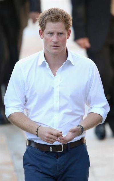 Britain's Prince Harry turns 30 with a beer - and millions