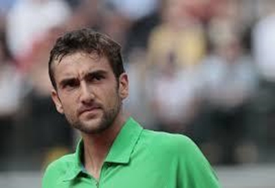 Williams fights back in China, Cilic also through