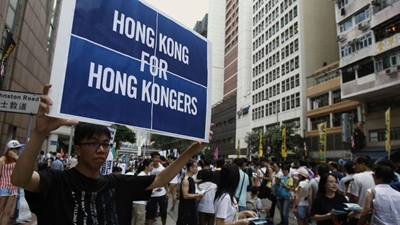 Taiwan throws support behind HK democracy demands