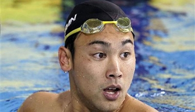 Japan's Tomita to be suspended for camera theft
