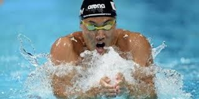 Putin given swimming award despite doping cases