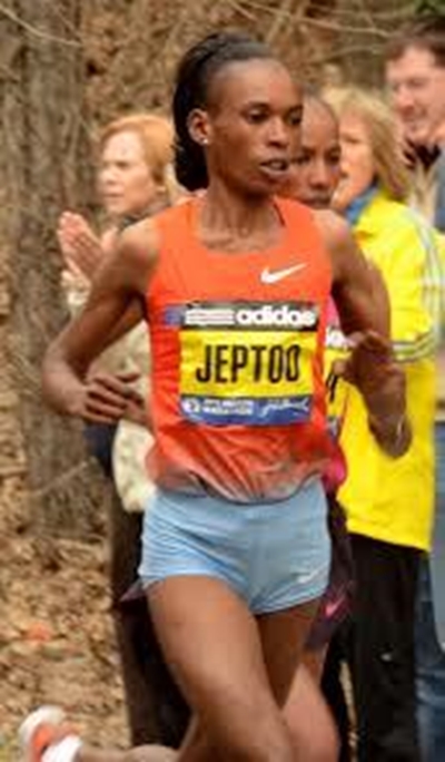 Kenya's Kipchoge, Jeptoo win at Chicago Marathon