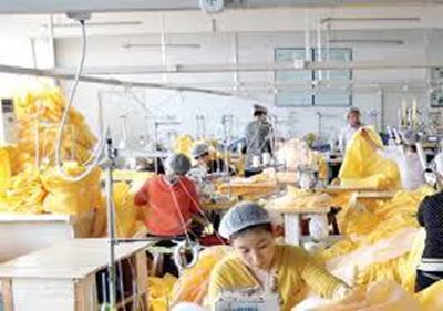 China factory whirs overtime to make Ebola suits