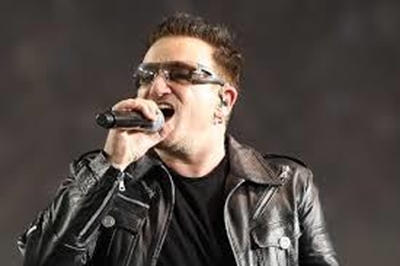 Bono's plane loses hatch before landing in Berlin