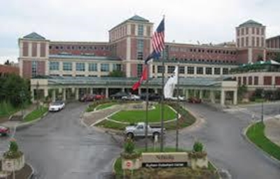 Surgeon with Ebola dies