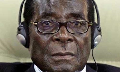 90-year-old Mugabe falls down steps