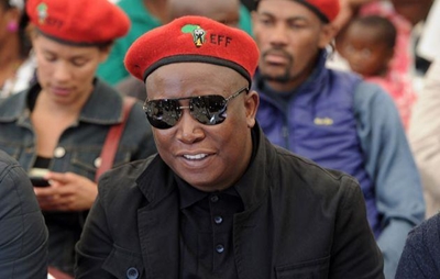 Malema sneaks in another 'Pay back the money'