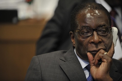 'Don't feed yourself until your tummy is full': Mugabe