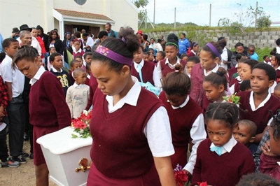 Young fire victim laid to rest
