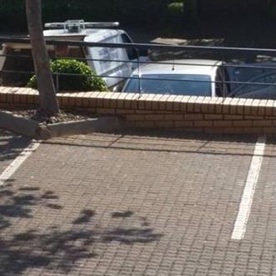 Woman found dead in parking lot