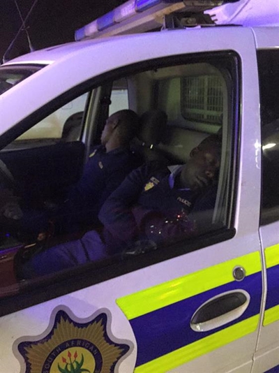 Police officers caught sleeping on duty
