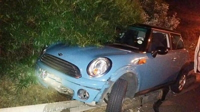 Crash motorist falls to her death