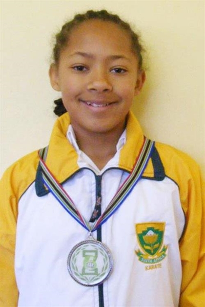 Protea-kleure vir jong karateka