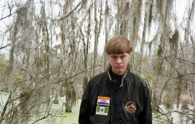 Charleston shooter pictured wearing old South African flag