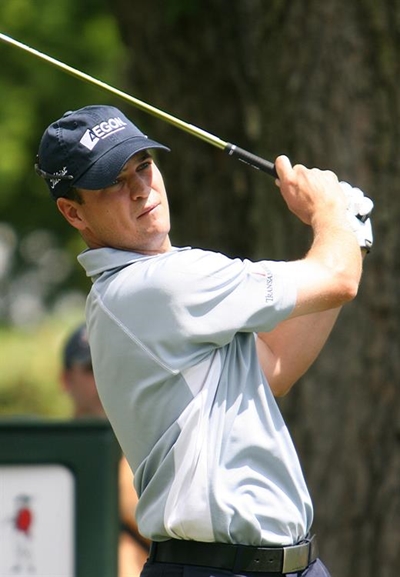 Johnson edges Oosthuizen in playoff