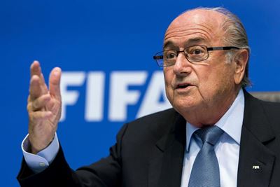 UK prankster throws money at Fifa's Sepp Blatter