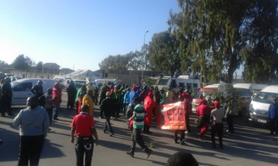 Police fire stun grenades during taxi protest