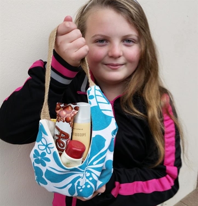 Donate a handbag, help a woman in need