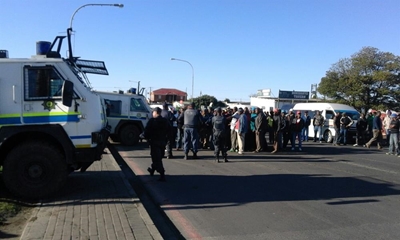 Arrested taxi driver still in custody