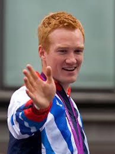 Rutherford adds world gold to Olympic title
