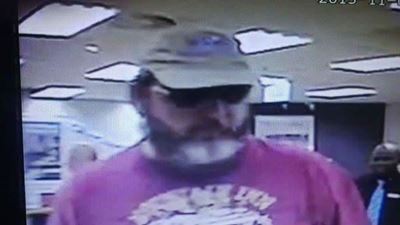 Robber threatens to blow up bank with hand grenade