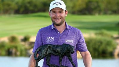 Grace leads WGC in China as McIlroy guts it out