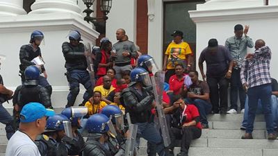Police fire stun grenades at striking Parliamentary workers