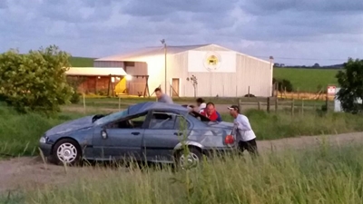 Man pinned beneath car after accident