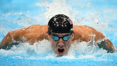 Phelps claims third race at Winter Championships