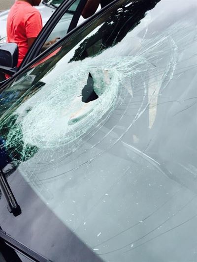 Mum and children survive stone-throwing ordeal