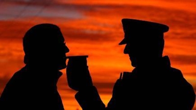 Drunk driver bites hand that holds breathalyser