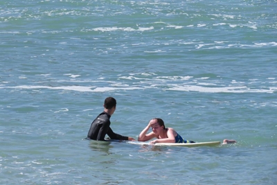 Local surfers save 2 from drowning