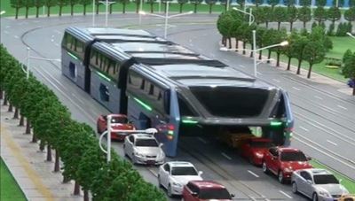 China's futuristic bus allows cars to pass underneath carriages