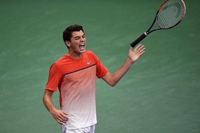 Federer to face fearless teen Fritz